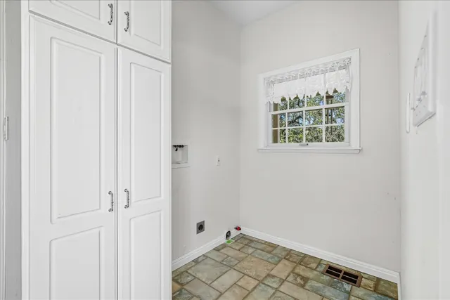 a en suite bathroom with a sink a mirror and a shower