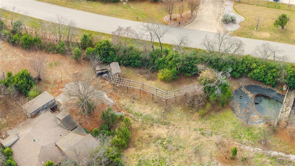 380 Dublin Road Parker, TX 75094 - Photo 9 of 25 a view of a lake with large trees