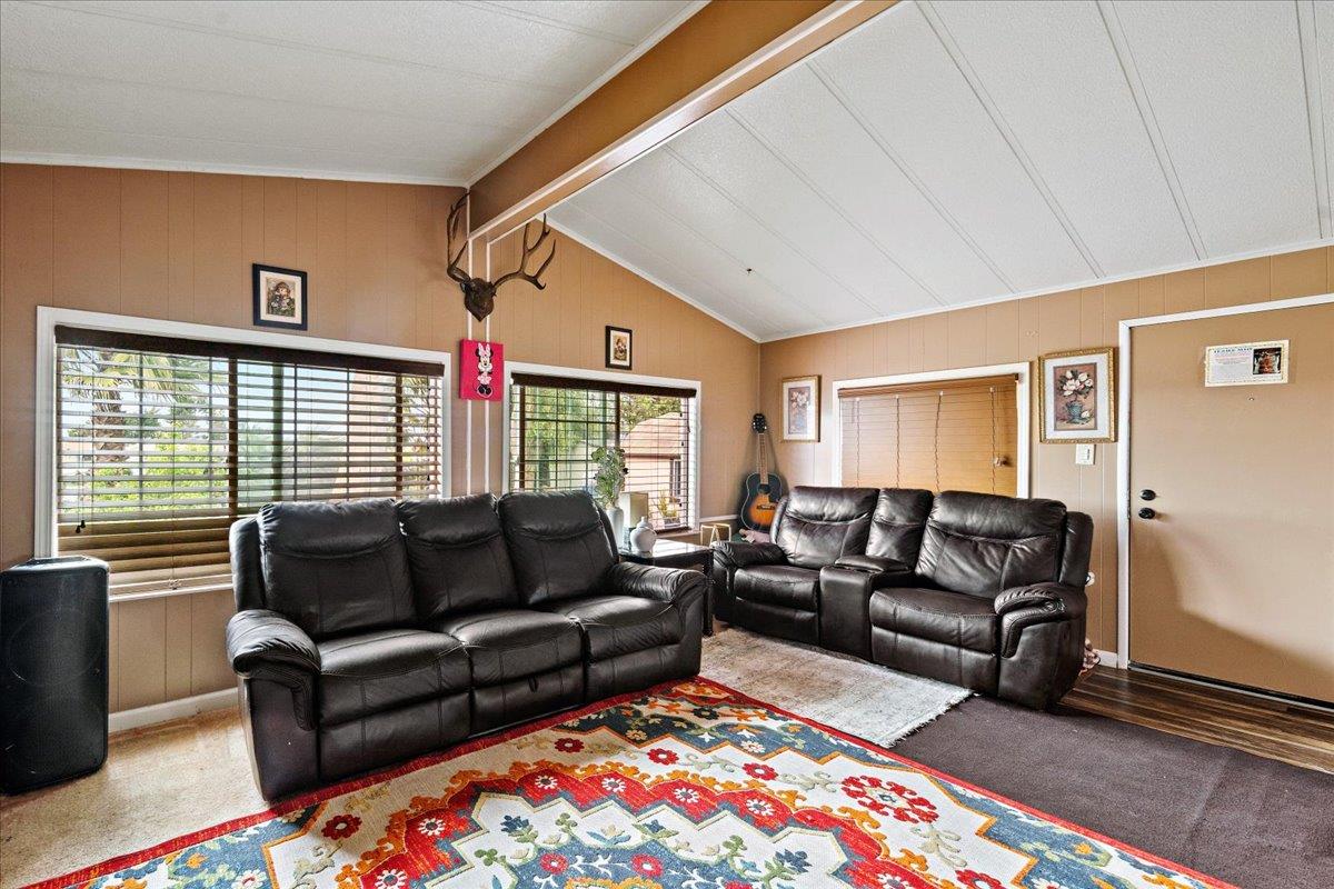 13607 Monte Del Sol, Unit 127 Castroville, CA 95012 - Photo 13 of 27 a living room with furniture and a couch