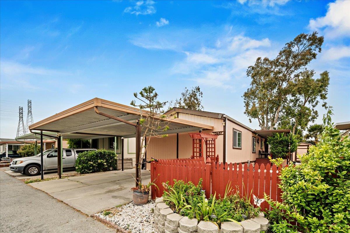 13607 Monte Del Sol, Unit 127 Castroville, CA 95012 - Photo 2 of 27 a front view of a house with a porch