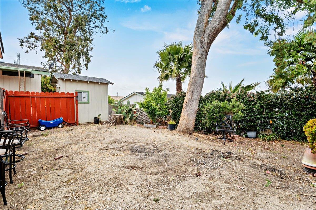 13607 Monte Del Sol, Unit 127 Castroville, CA 95012 - Photo 26 of 27 a view of a house with a yard and tree
