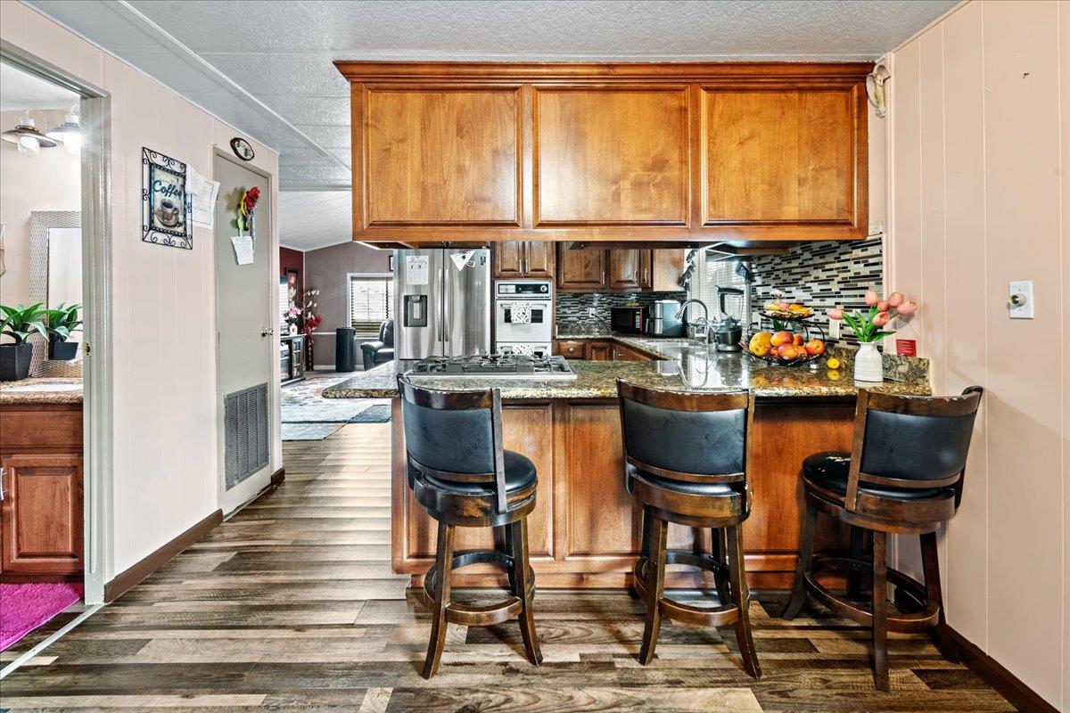 13607 Monte Del Sol, Unit 127 Castroville, CA 95012 - Photo 8 of 27 a dining room with furniture and window