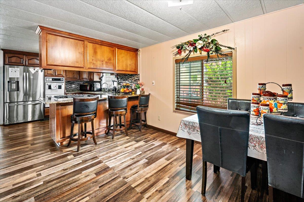 13607 Monte Del Sol, Unit 127 Castroville, CA 95012 - Photo 10 of 27 a view of a dining room with furniture window and outside view