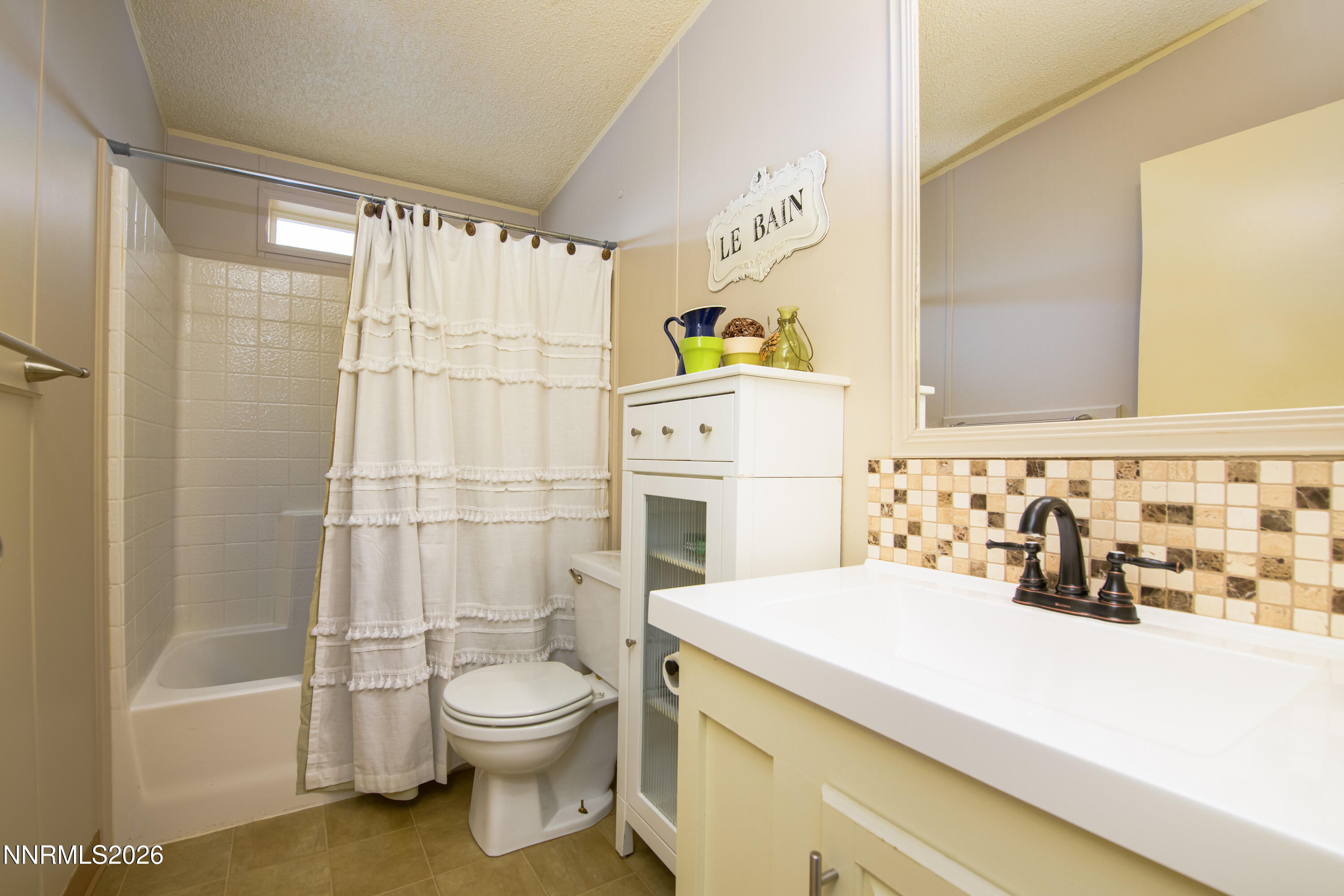 1355 Sandstone Drive Topaz Ranch Estates, NV 89444 - Photo 21 of 57 a bathroom with a sink toilet and shower