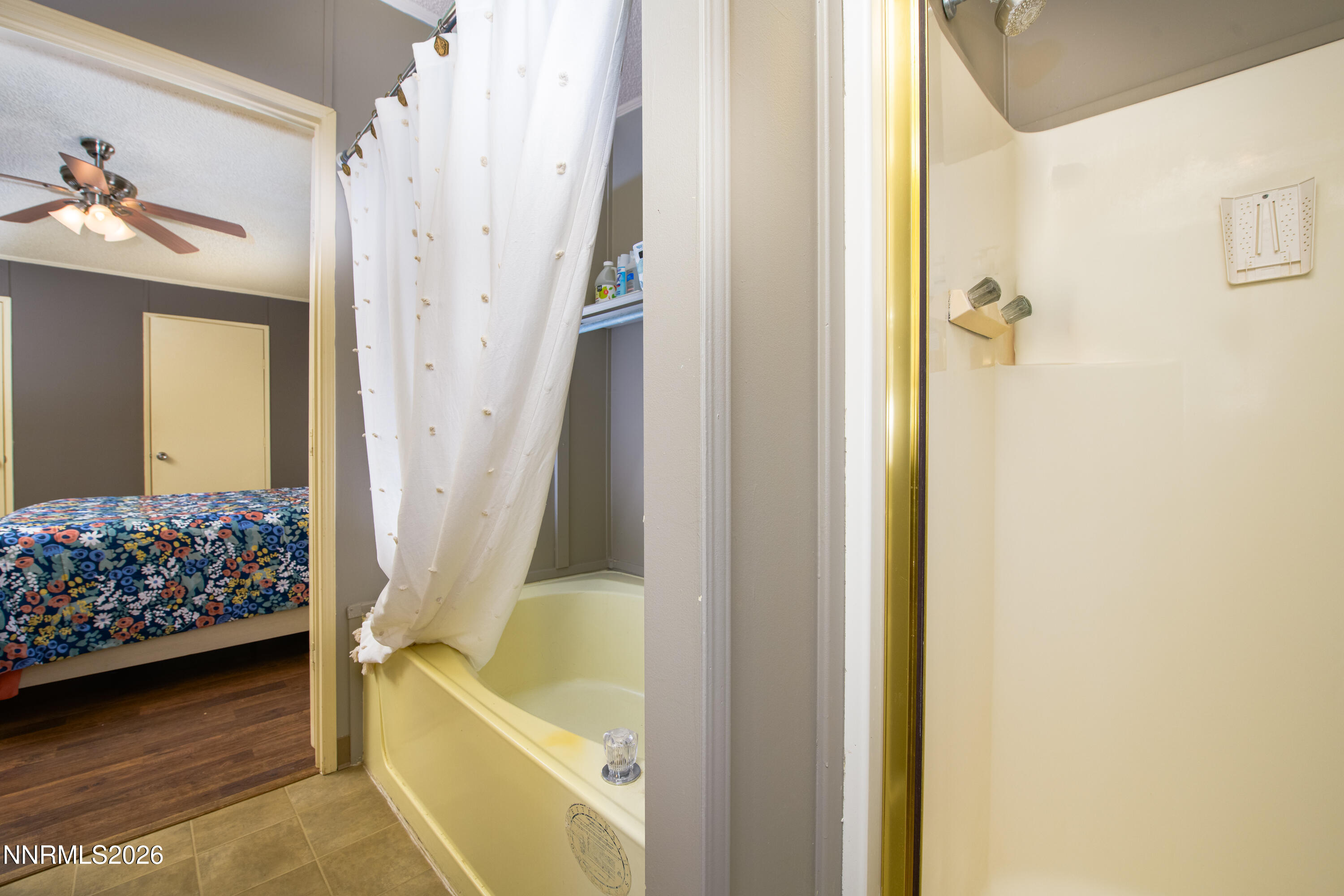 1355 Sandstone Drive Topaz Ranch Estates, NV 89444 - Photo 25 of 57 a bathroom with a tub and shower