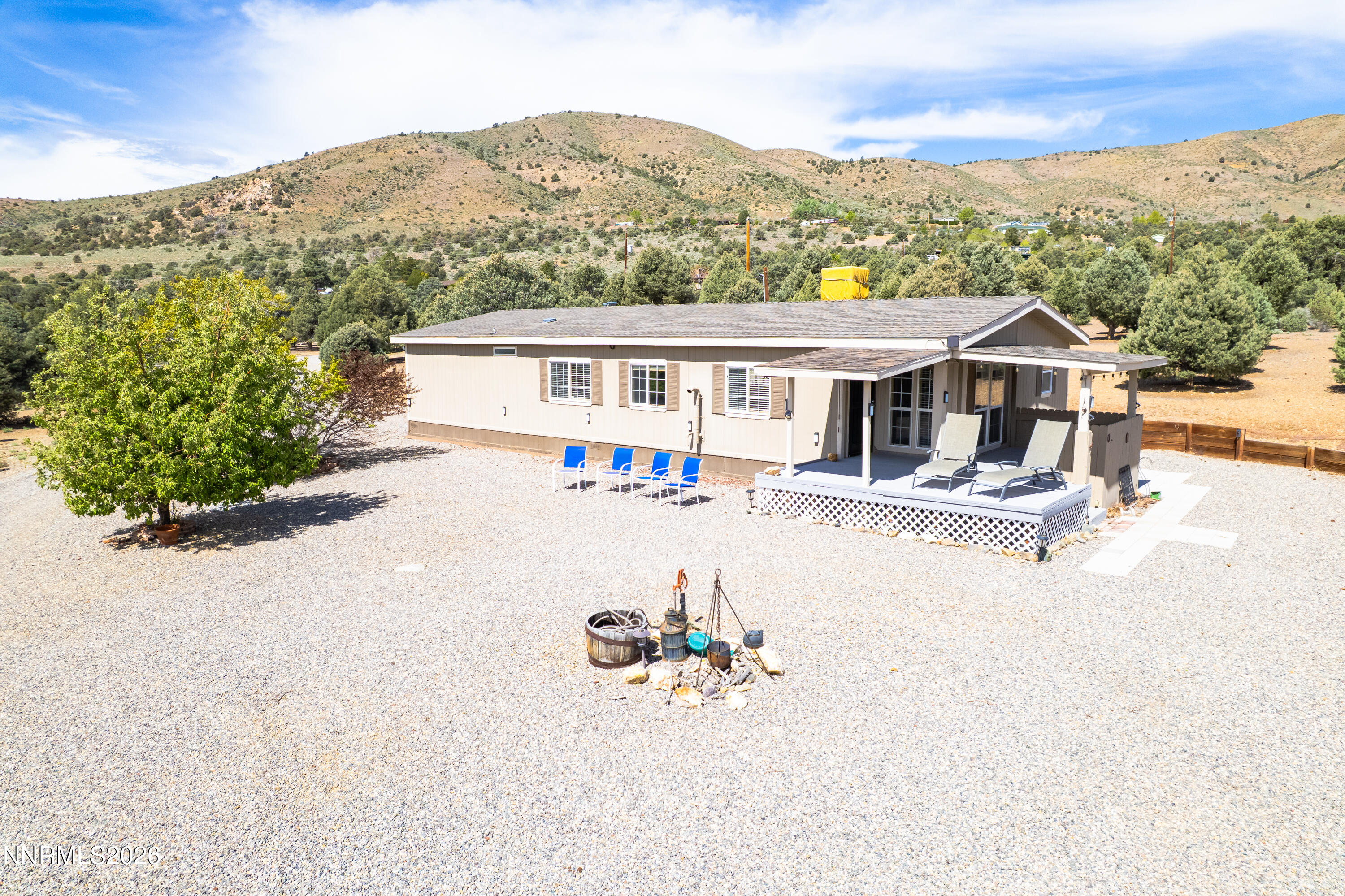 1355 Sandstone Drive Topaz Ranch Estates, NV 89444 - Photo 29 of 57 front view of a house with a patio