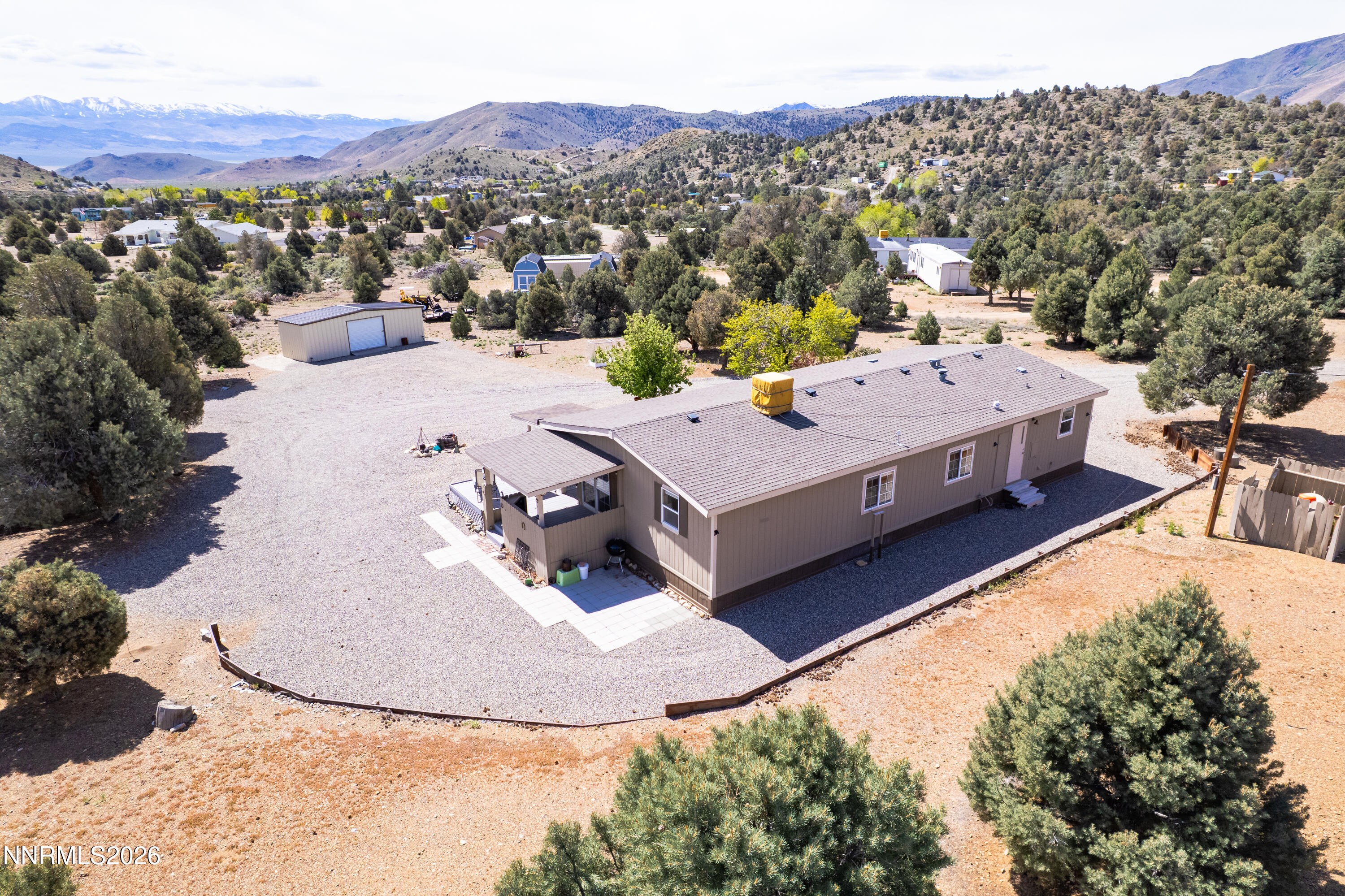 1355 Sandstone Drive Topaz Ranch Estates, NV 89444 - Photo 3 of 57 a view of a house with a yard