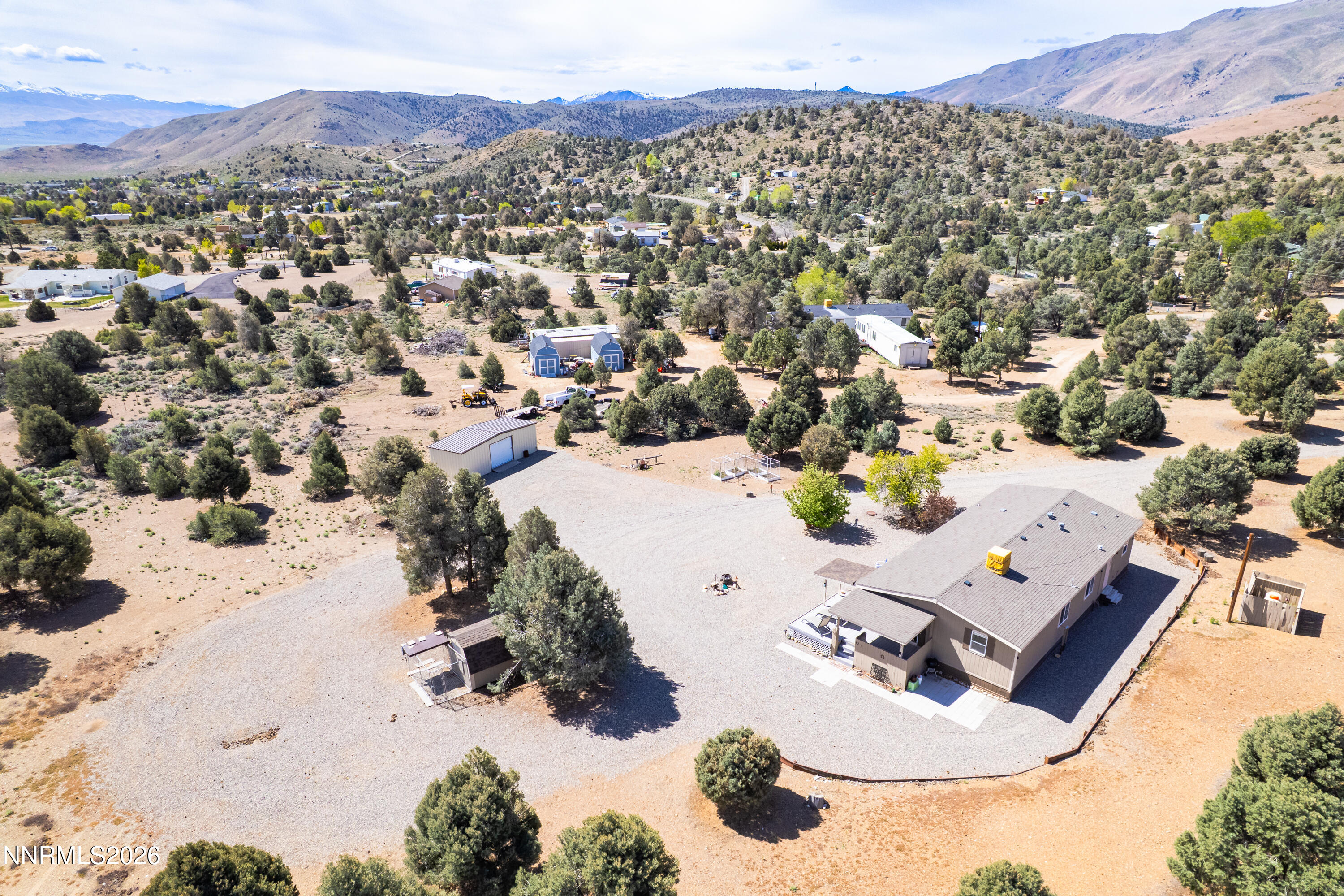 1355 Sandstone Drive Topaz Ranch Estates, NV 89444 - Photo 33 of 57 an aerial view of a house with a swimming pool