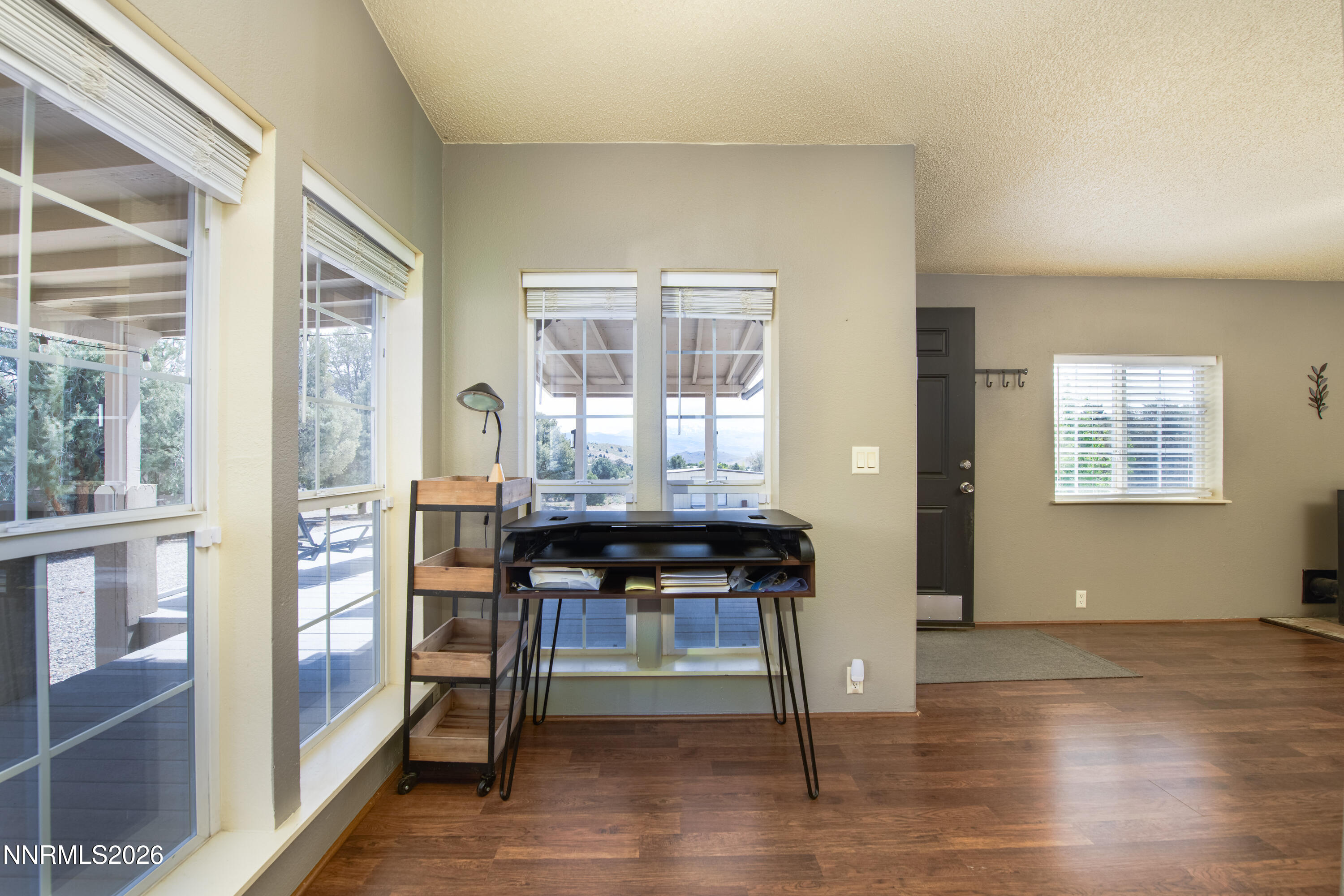 1355 Sandstone Drive Topaz Ranch Estates, NV 89444 - Photo 5 of 57 a workspace with wooden floor
