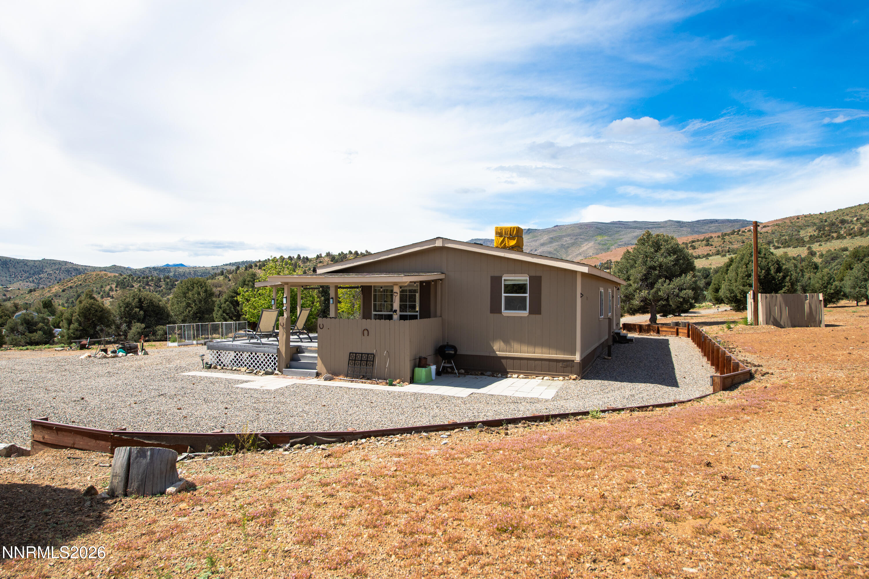 1355 Sandstone Drive Topaz Ranch Estates, NV 89444 - Photo 52 of 57 a house view with a roof yard