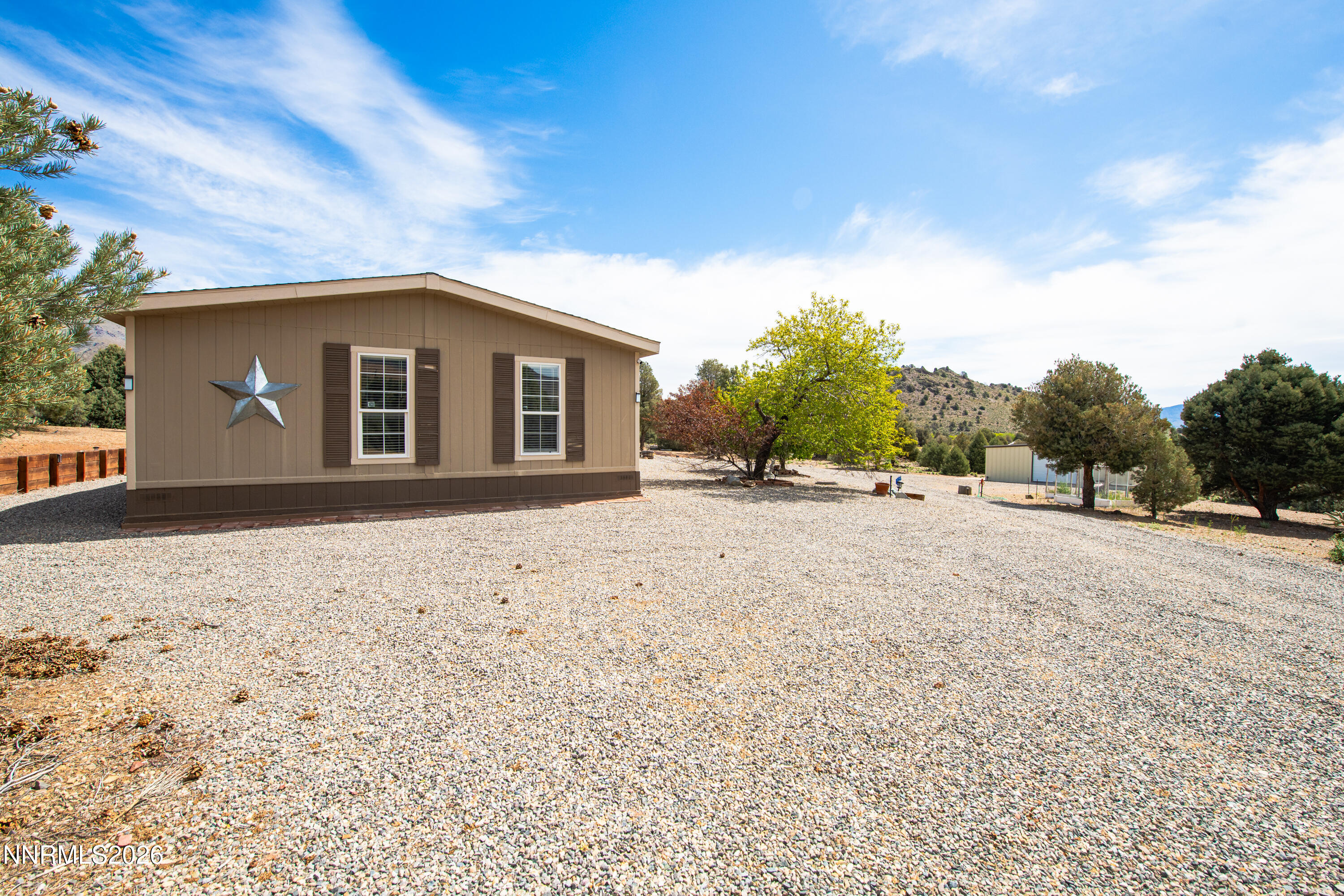 1355 Sandstone Drive Topaz Ranch Estates, NV 89444 - Photo 53 of 57 a view of house with yard and entertaining space