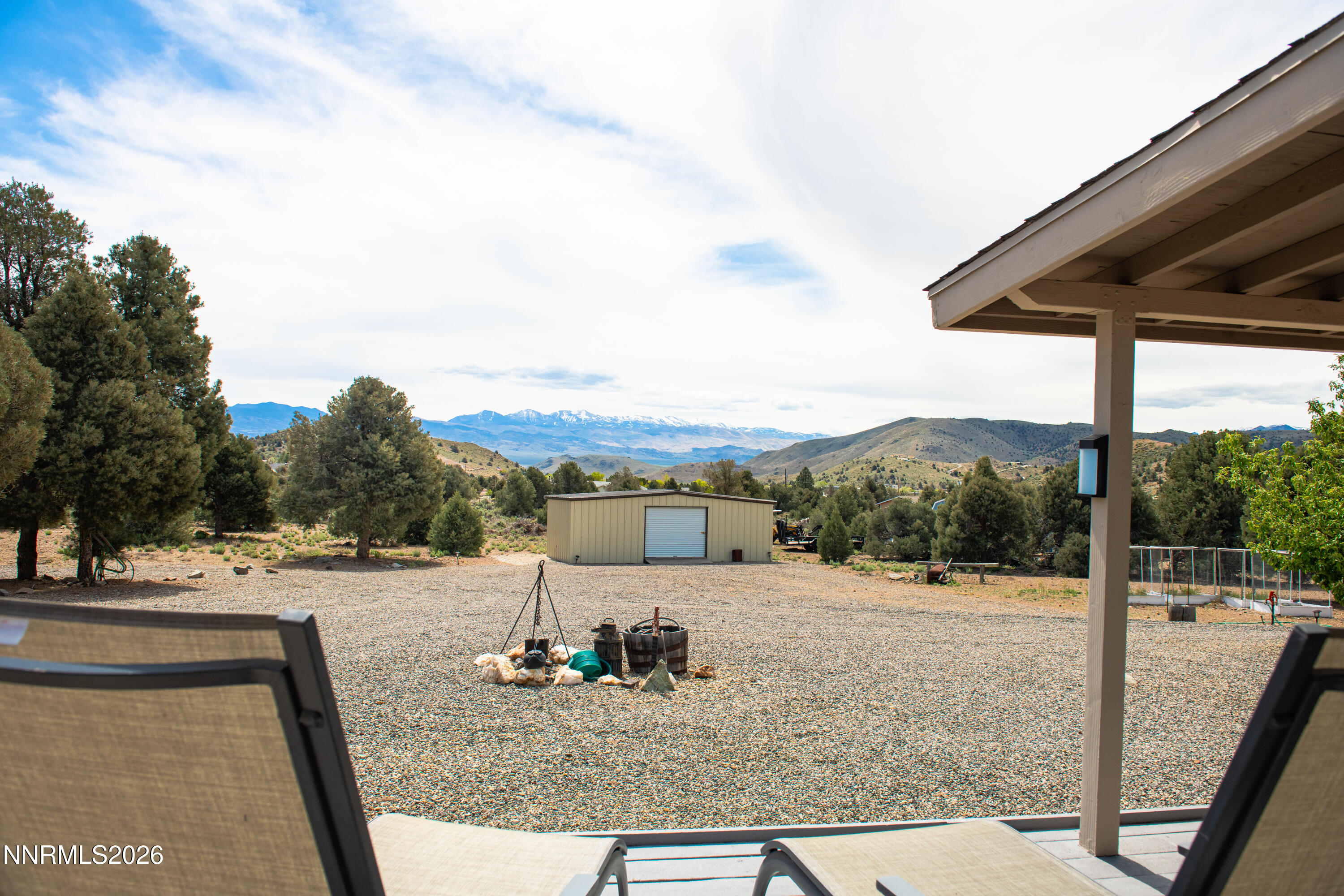 1355 Sandstone Drive Topaz Ranch Estates, NV 89444 - Photo 56 of 57 a view of a house with backyard and sitting area