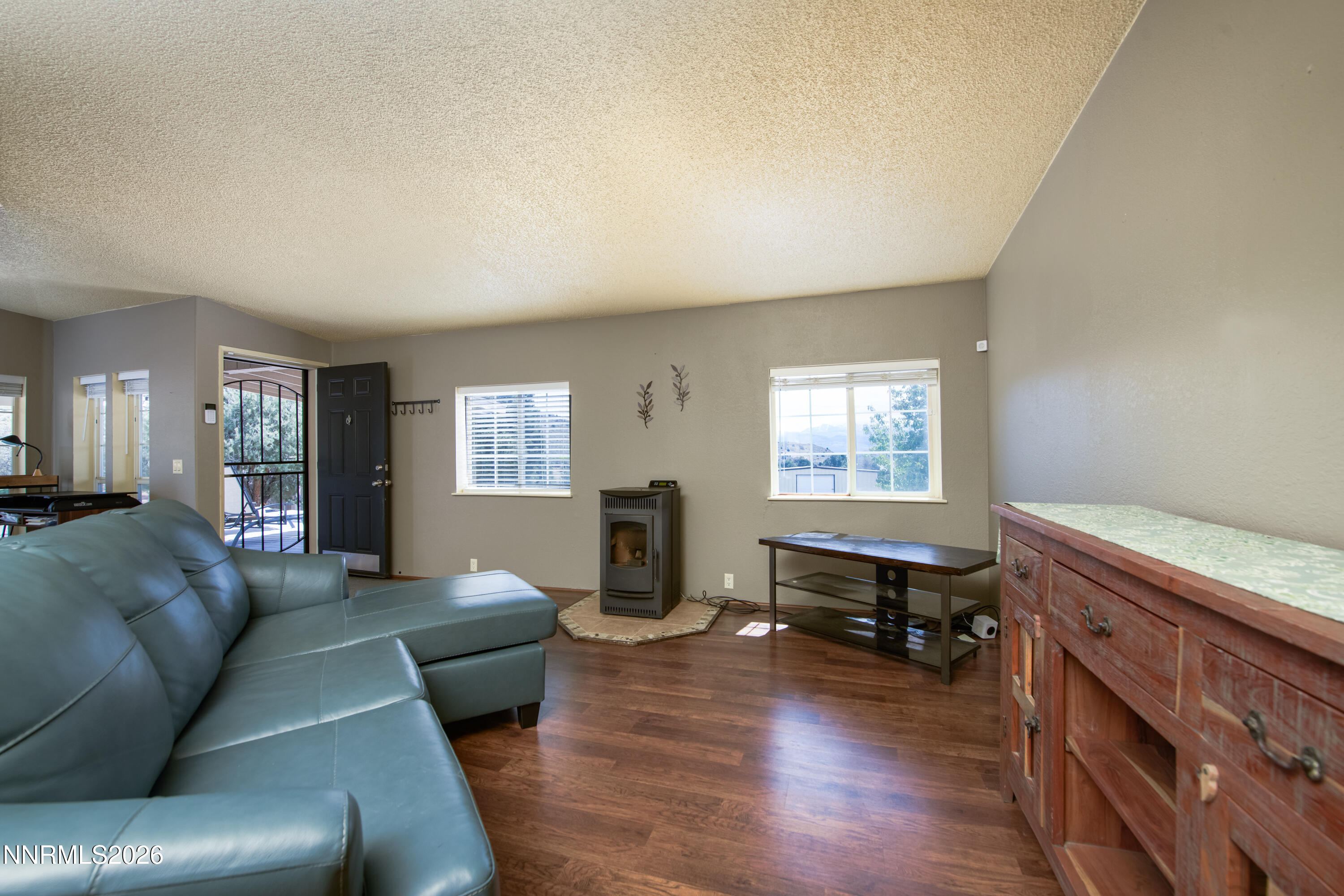 1355 Sandstone Drive Topaz Ranch Estates, NV 89444 - Photo 8 of 57 a living room with furniture and a wooden floor