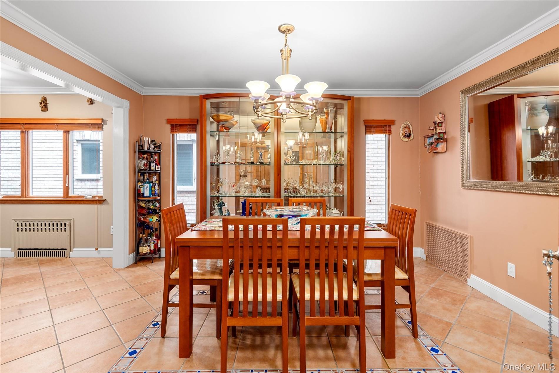 21-34 74th Street Queens, NY 11370 - Photo 8 of 20 a view of a dining room with furniture window and outside view