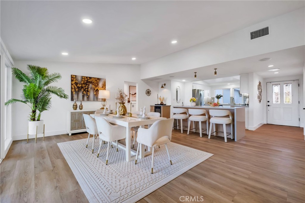 26700 Indian Peak Road Rancho Palos Verdes, CA 90275 - Photo 11 of 40 a view of a dining room with furniture and wooden floor