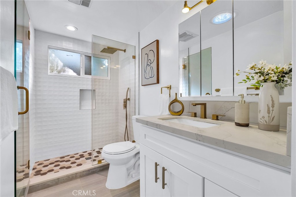 26700 Indian Peak Road Rancho Palos Verdes, CA 90275 - Photo 13 of 40 a bathroom with a sink a toilet and shower