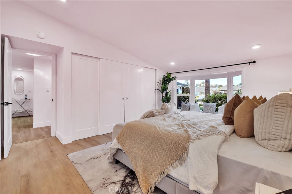 26700 Indian Peak Road Rancho Palos Verdes, CA 90275 - Photo 21 of 40 a bedroom with a large bed and a large window
