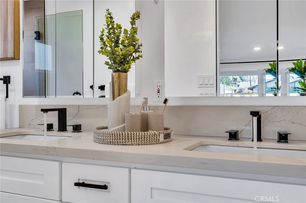 26700 Indian Peak Road Rancho Palos Verdes, CA 90275 - Photo 24 of 40 a kitchen with a sink and a mirror
