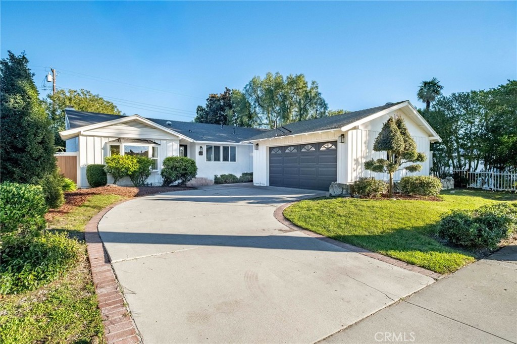26700 Indian Peak Road Rancho Palos Verdes, CA 90275 - Photo 35 of 40 a front view of a house with a yard