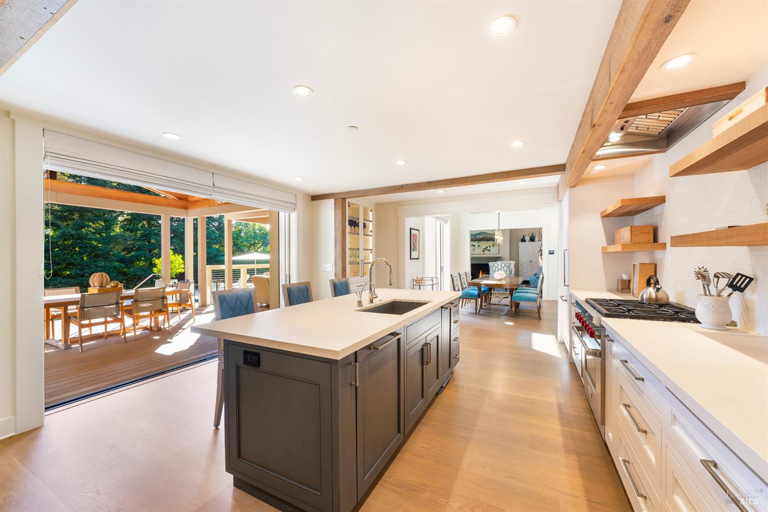 1711 Spring Street St. Helena, CA 94574 - Photo 11 of 38 a large room with kitchen island a large window in it