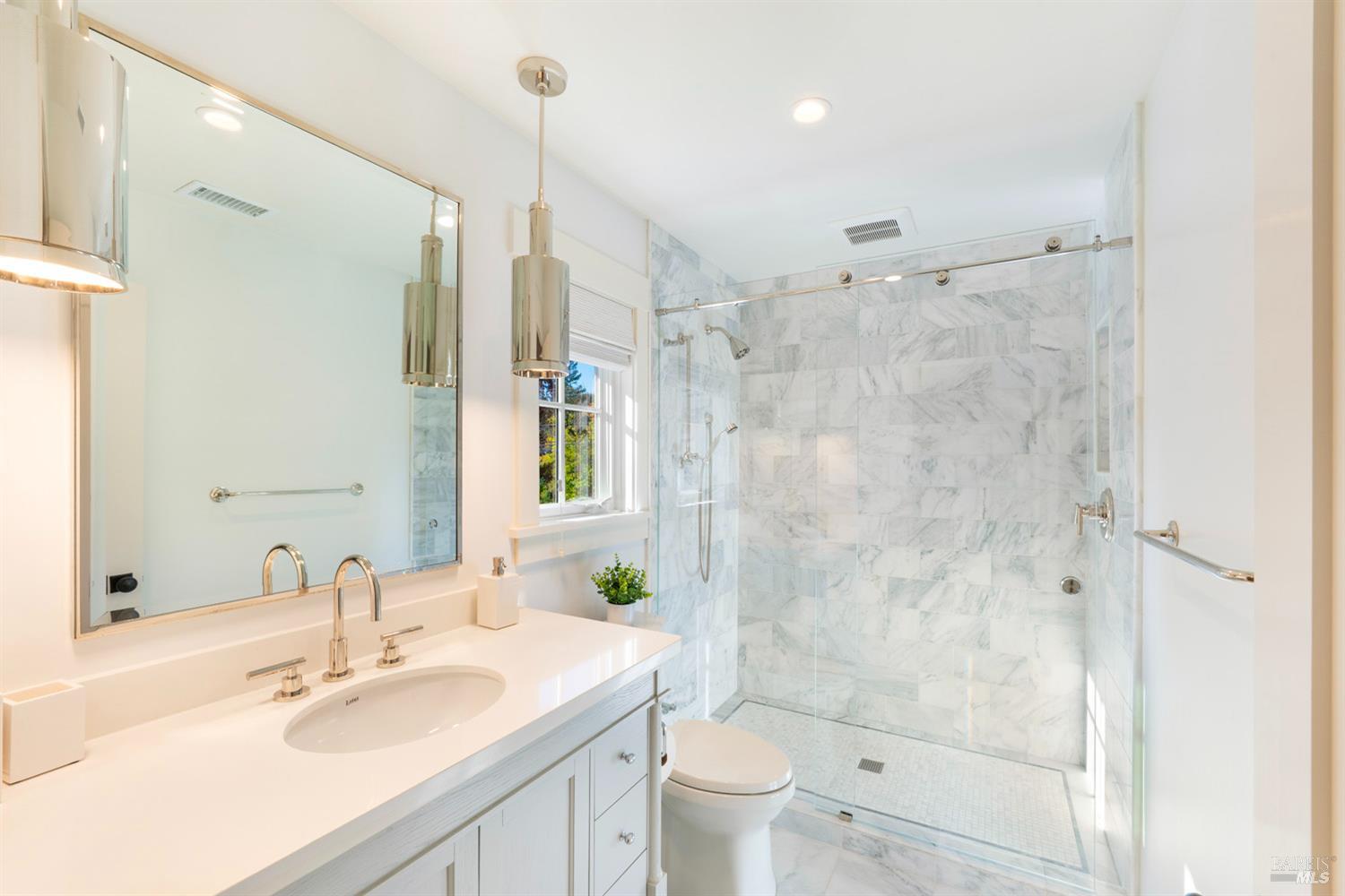 1711 Spring Street St. Helena, CA 94574 - Photo 32 of 38 a bathroom with a sink vanity granite toilet and shower