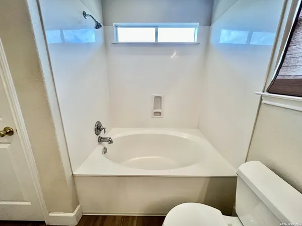 a bathroom with a sink and toilet