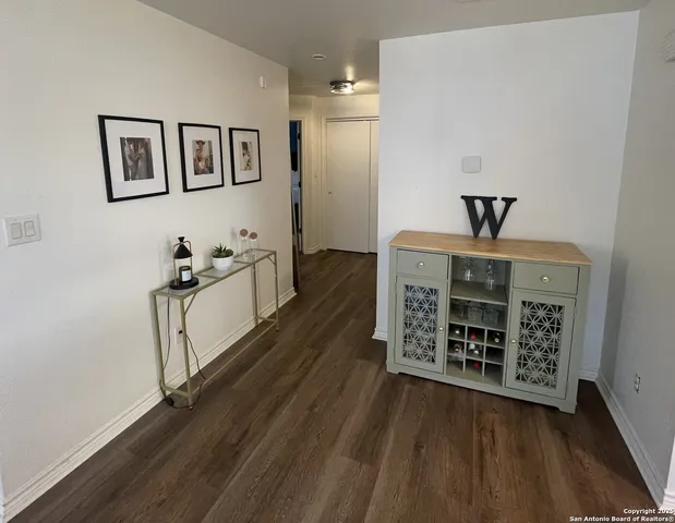 a view of a hallway with workspace