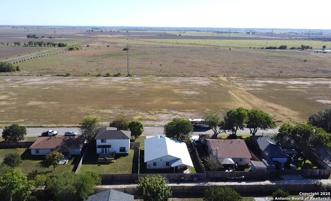 1408 33rd Street Hondo, TX 78861 - Photo 4 of 19 an aerial view of ocean and residential houses with outdoor space