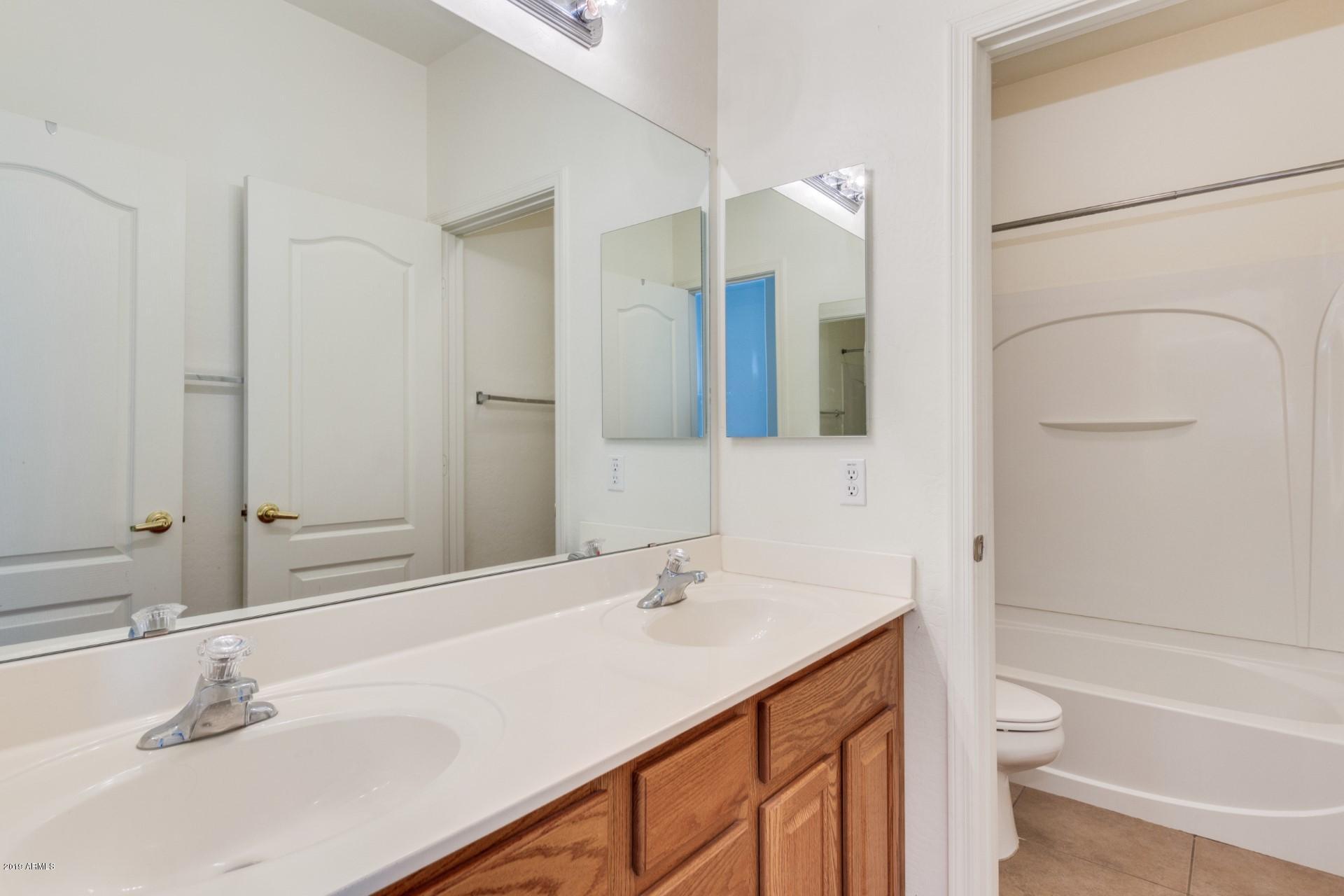 7008 West Carter Road Laveen, AZ 85339 - Photo 13 of 21 Hall Bath