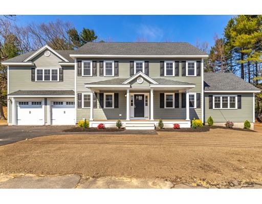 7 Tremlett Road Billerica, MA 01821 - Photo 1 of 30 a front view of a house with a yard