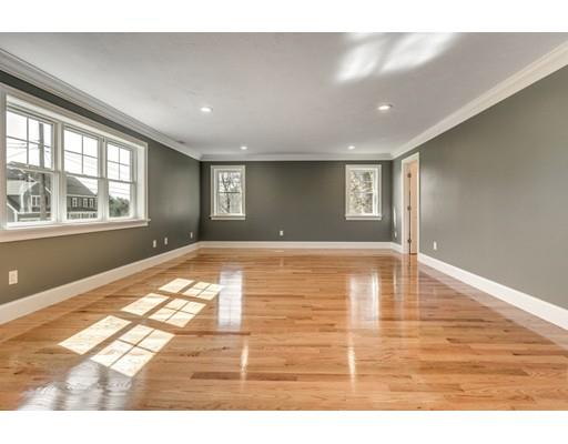 7 Tremlett Road Billerica, MA 01821 - Photo 17 of 30 a view of empty room with wooden floor and fan