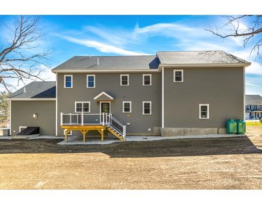 7 Tremlett Road Billerica, MA 01821 - Photo 30 of 30 a front view of a house with a yard