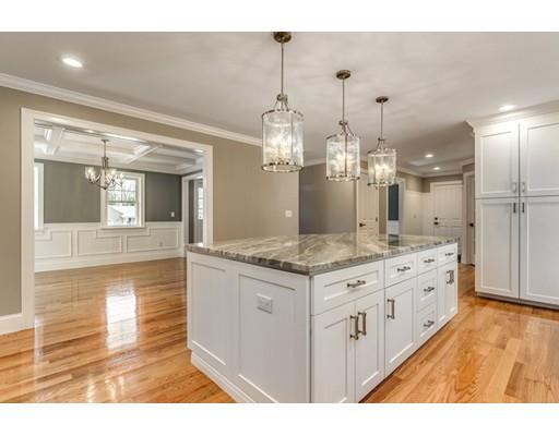 7 Tremlett Road Billerica, MA 01821 - Photo 9 of 30 a bathroom with a granite countertop sink a mirror and a shower