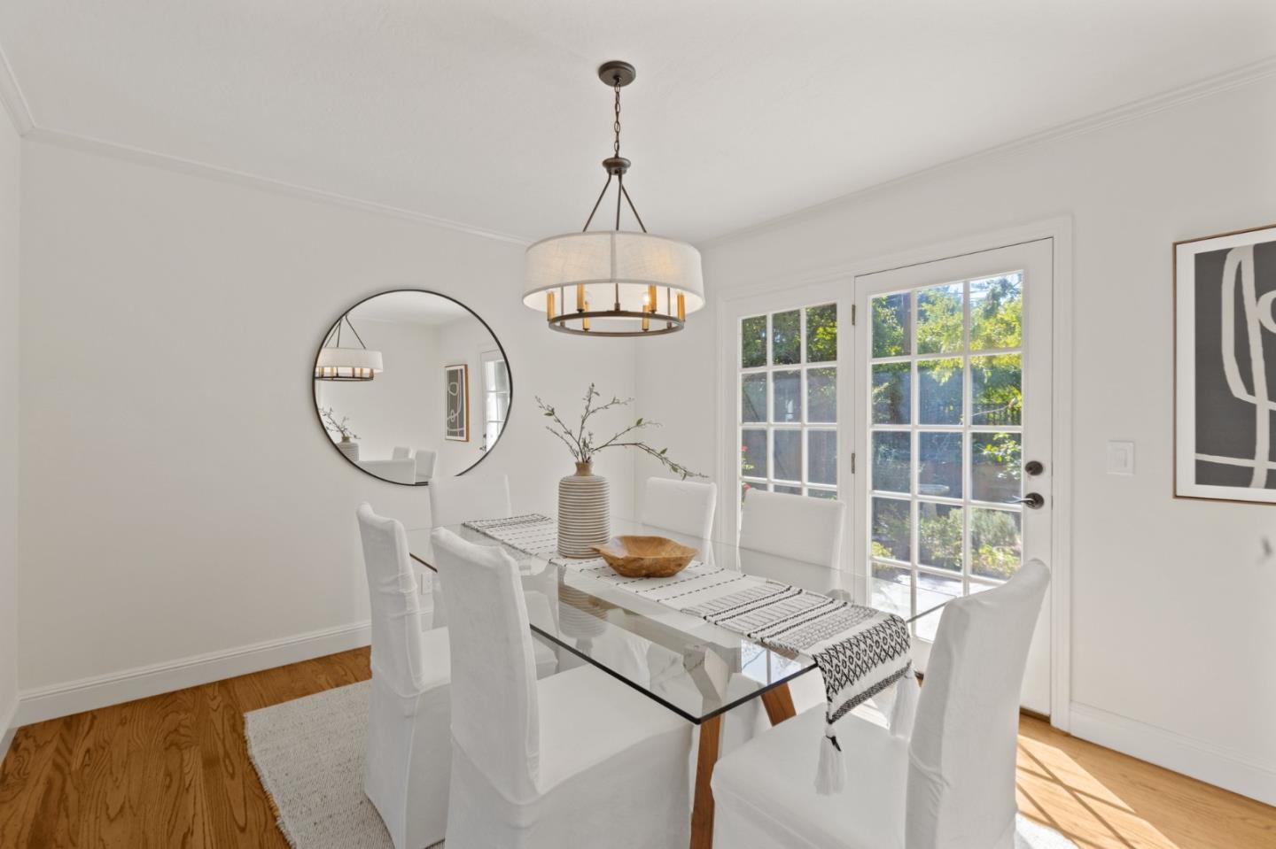 143 Waverly Place Mountain View, CA 94040 - Photo 12 of 52 a living room with table chairs and a chandelier