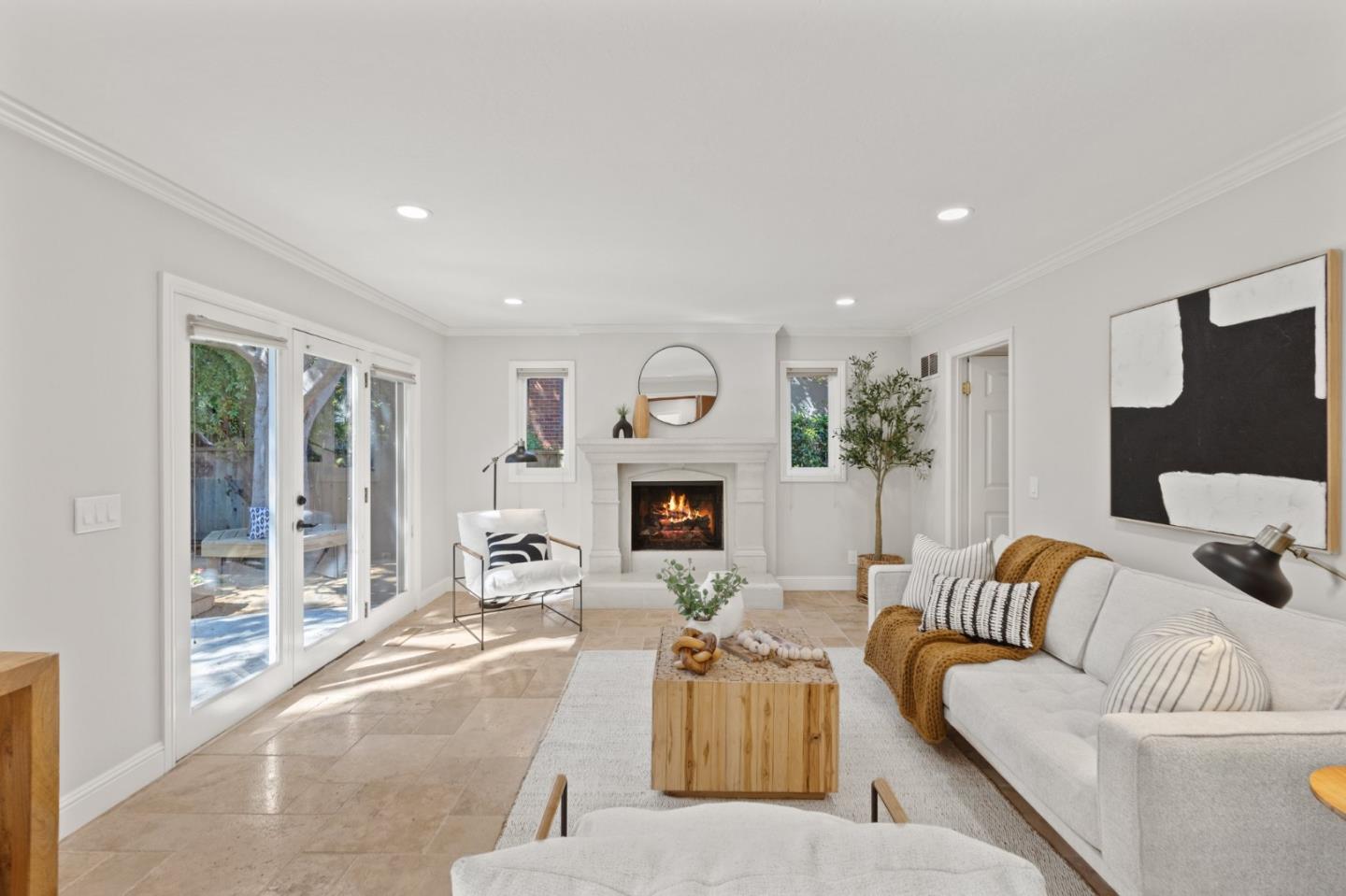 143 Waverly Place Mountain View, CA 94040 - Photo 14 of 52 a living room with furniture a fireplace and a floor to ceiling window