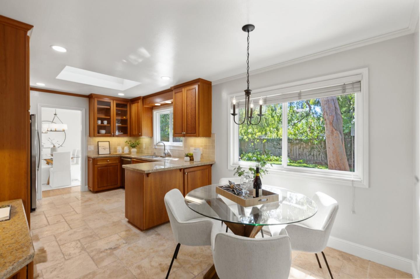 143 Waverly Place Mountain View, CA 94040 - Photo 19 of 52 a kitchen with a table and chairs