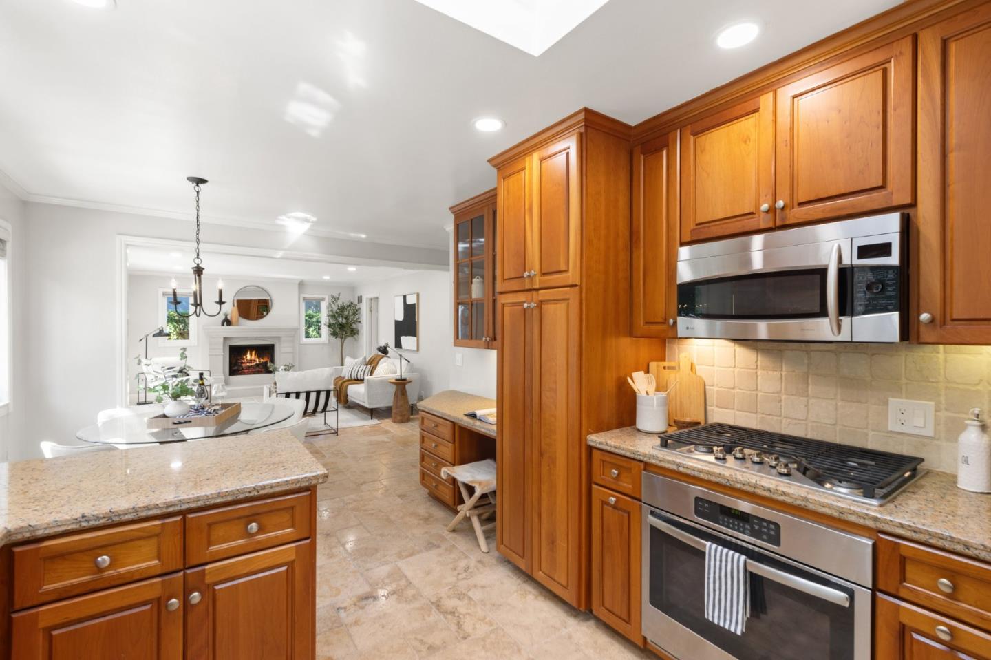143 Waverly Place Mountain View, CA 94040 - Photo 23 of 52 a kitchen with stainless steel appliances granite countertop a stove a sink and a microwave
