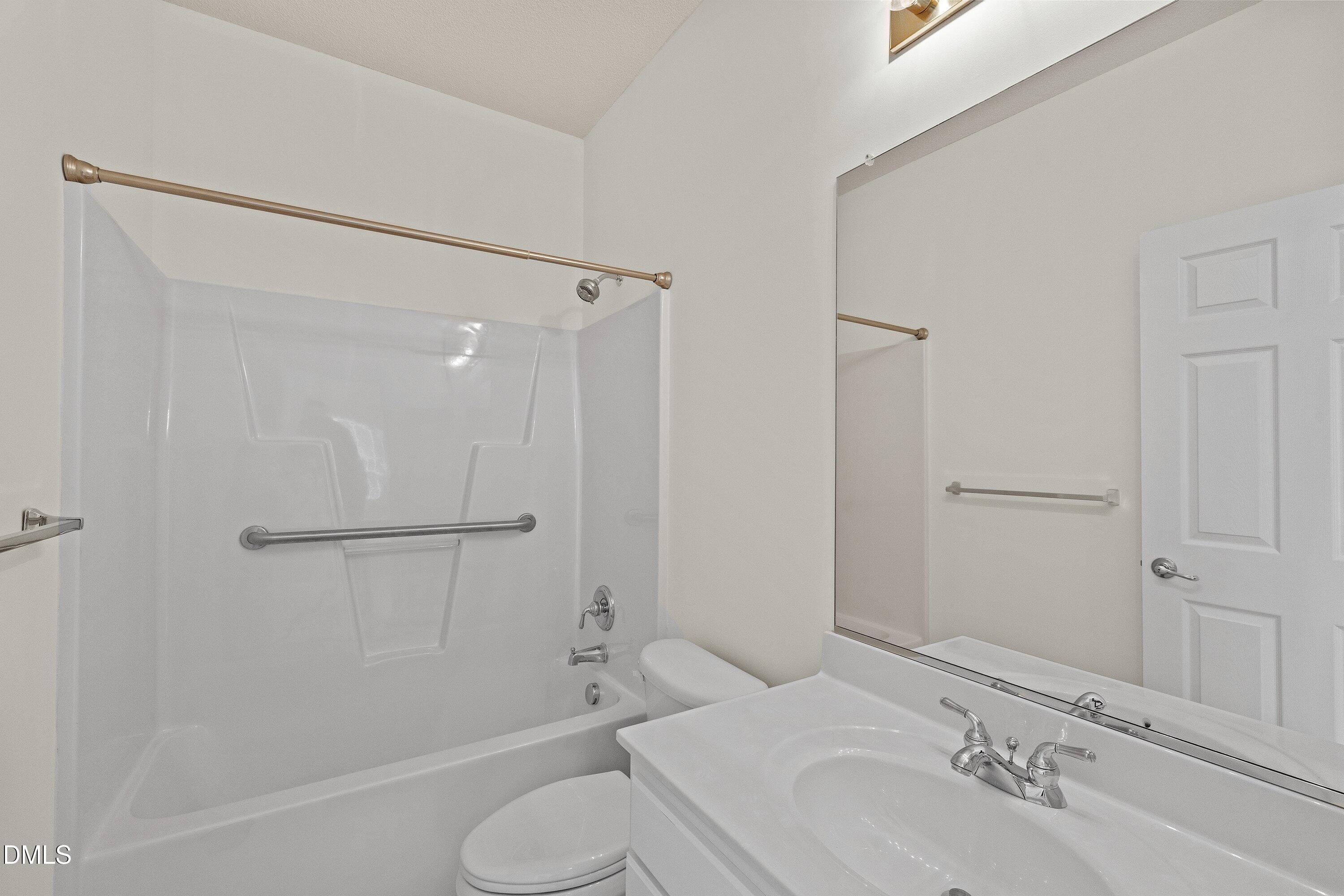 105 Rockport Ridge Way Cary, NC 27519 - Photo 24 of 43 a bathroom with a sink toilet and shower