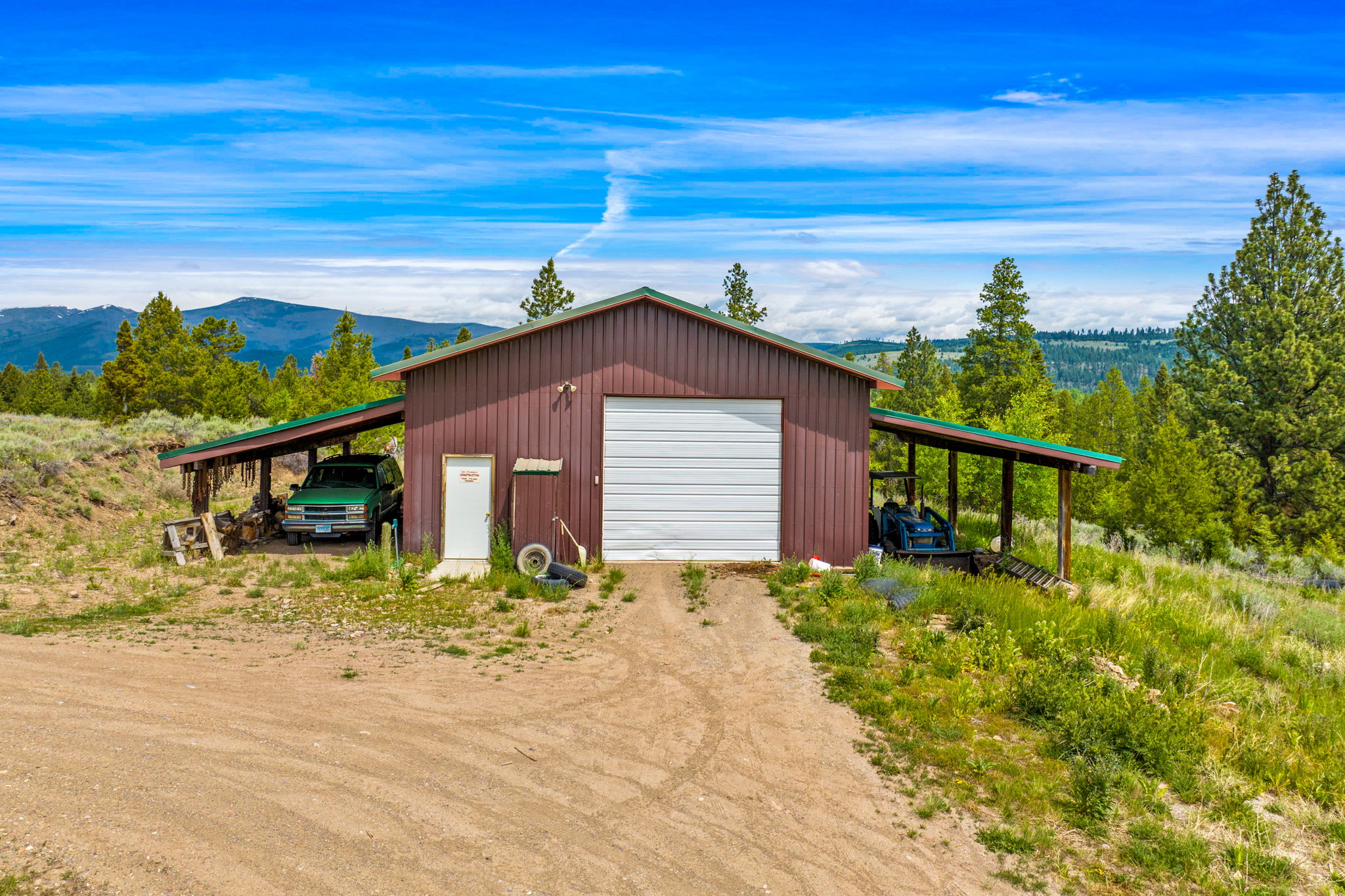 3358 Strandskov Road Lincoln, MT 59639 - Photo 70 of 80 View of outbuilding with driveway and a mountain view