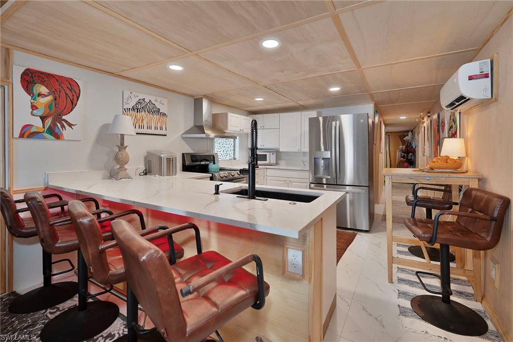 777 Walkerbilt Road, Unit 34 Naples, FL 34110 - Photo 1 of 23 Open / New Kitchen