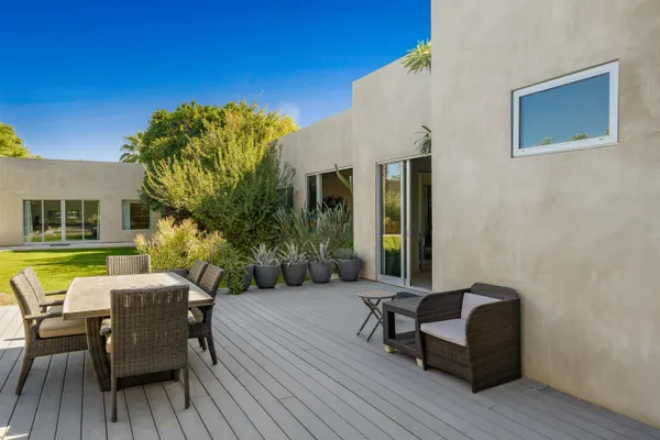 a kitchen with stainless steel appliances granite countertop a stove and a microwave