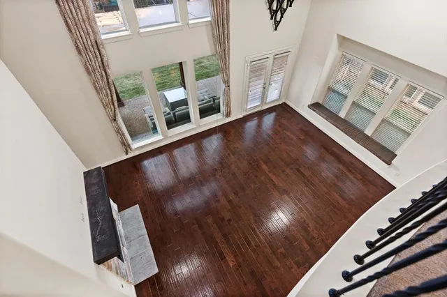 a view of an entryway with wooden floor