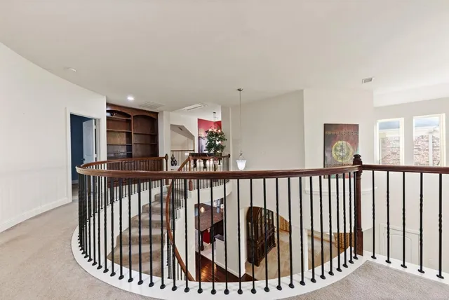 a view of hallway with a couch