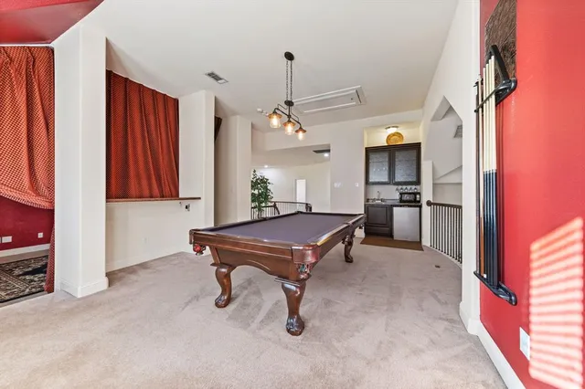 a room with furniture and a chandelier