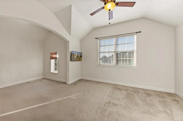 a view of empty room with windows