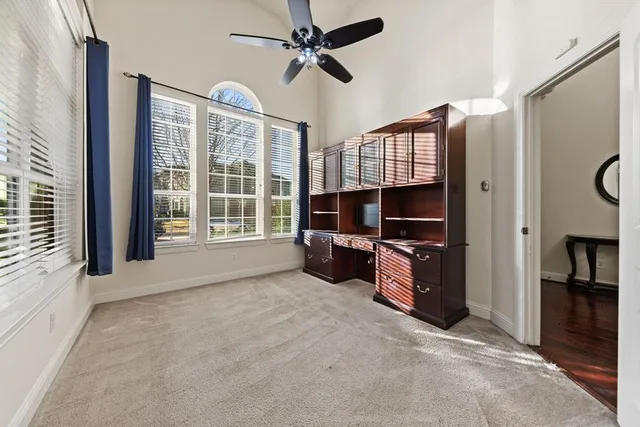 a view of workspace with furniture and windows