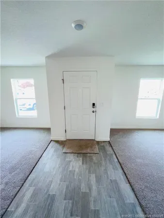 a view of an empty room and window
