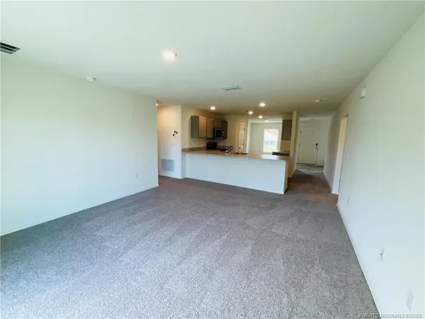 a view of a big room with a fireplace