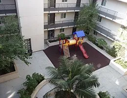an aerial view of a house with outdoor space