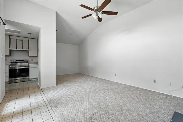 wooden floor fireplace and windows in a room